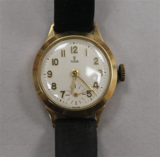 A ladys Rolex Tudor 9ct gold-cased wristwatch, on leather strap, in red heart-shaped box.